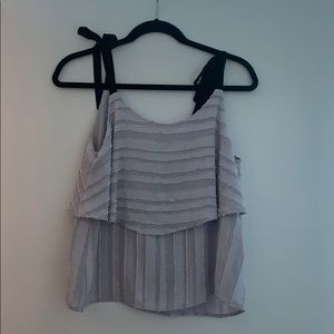 Grey/silver tank with black straps